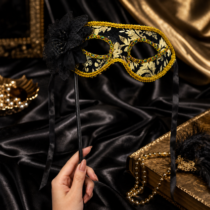 Hand Holding Mask Black & Gold