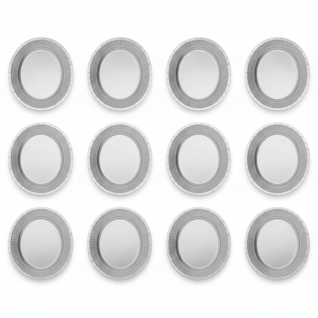 Flat lay of 8 silver shimmering oval platter plates on white background