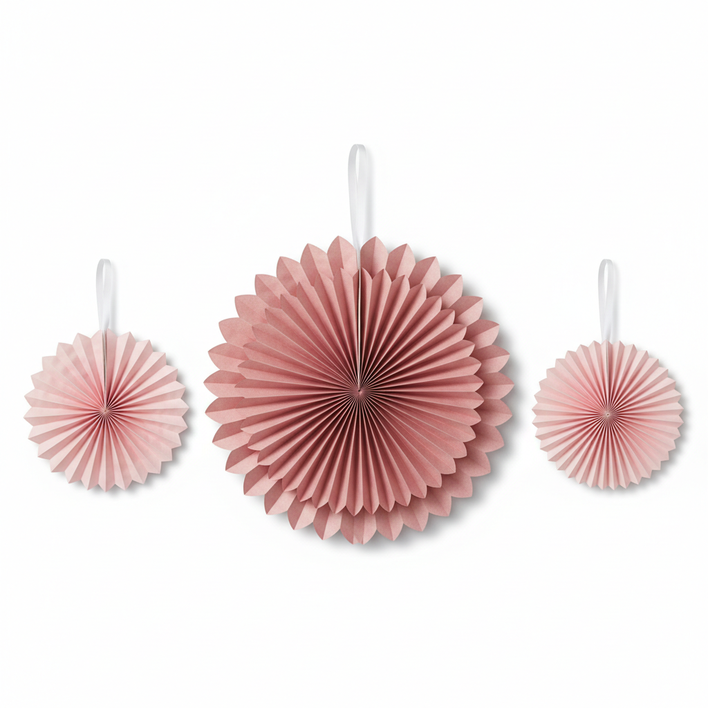 Close-up of pink paper fan decorations showing 3 different sizes
