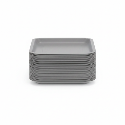 Flat lay of 8 square grey paper plates on white background